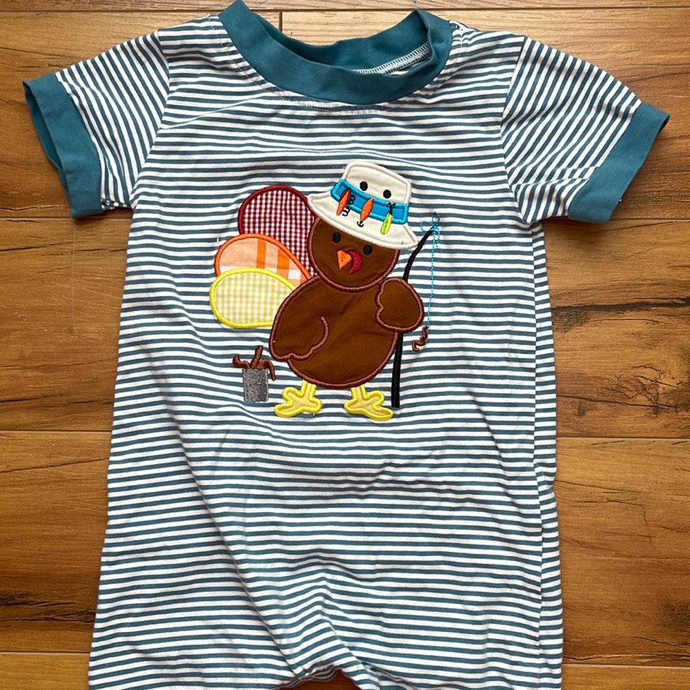 Smocked by Laya and Linc. Boys short sleeve romper with button bottom. Size 18M